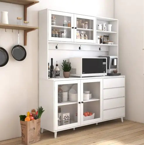 White kitchen cabinet with shelves and a microwave in a modern kitchen setting.