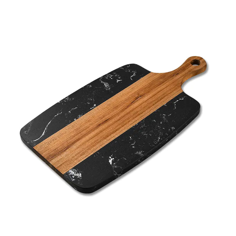 Marble-patterned cutting board with wooden handle on a white background