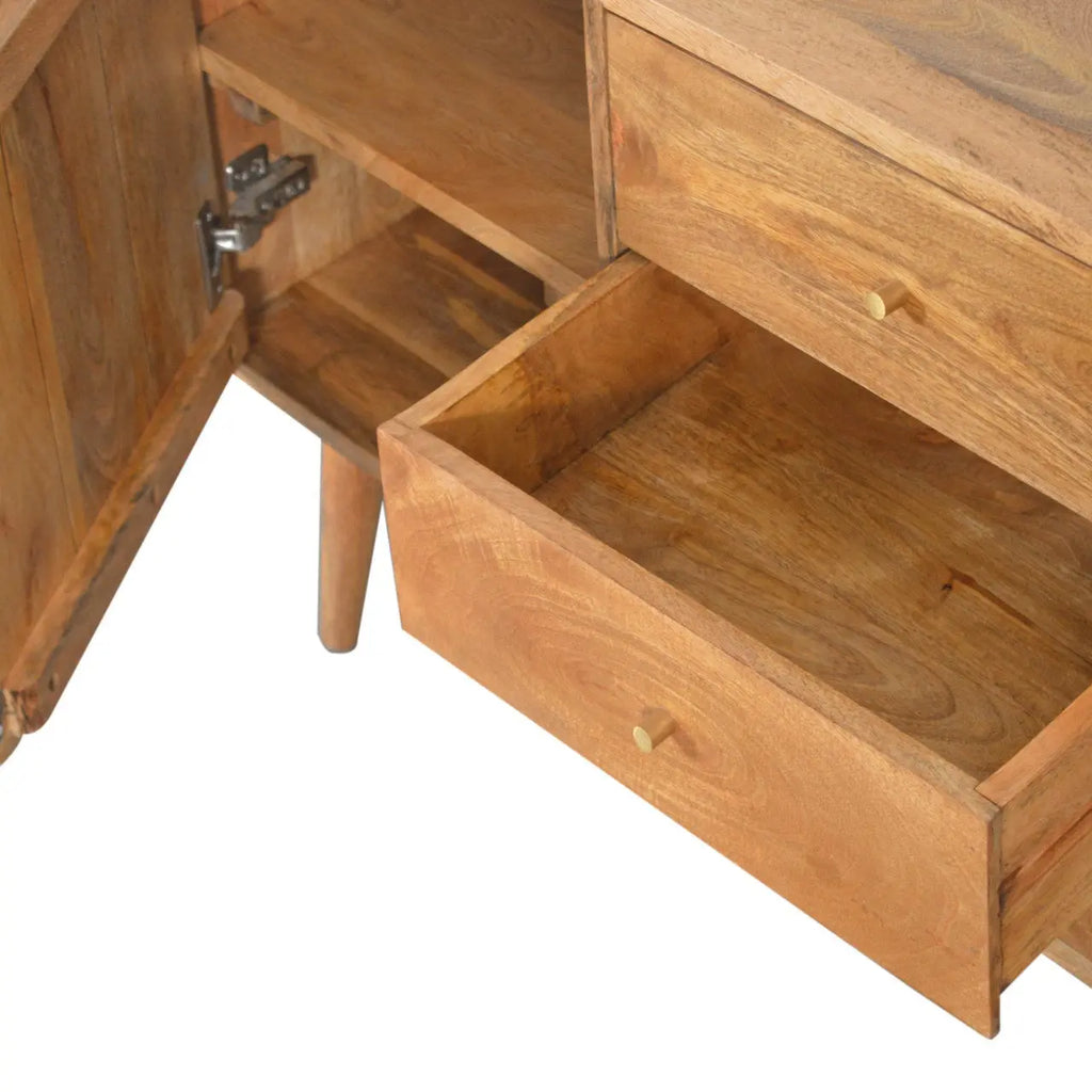 close up of hand carved cube design and wood grain texture
