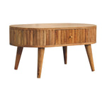 Wooden side table with a single drawer on a white background