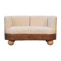 Bouclé upholstered sofa with buffalo leather seat and solid mango wood feet