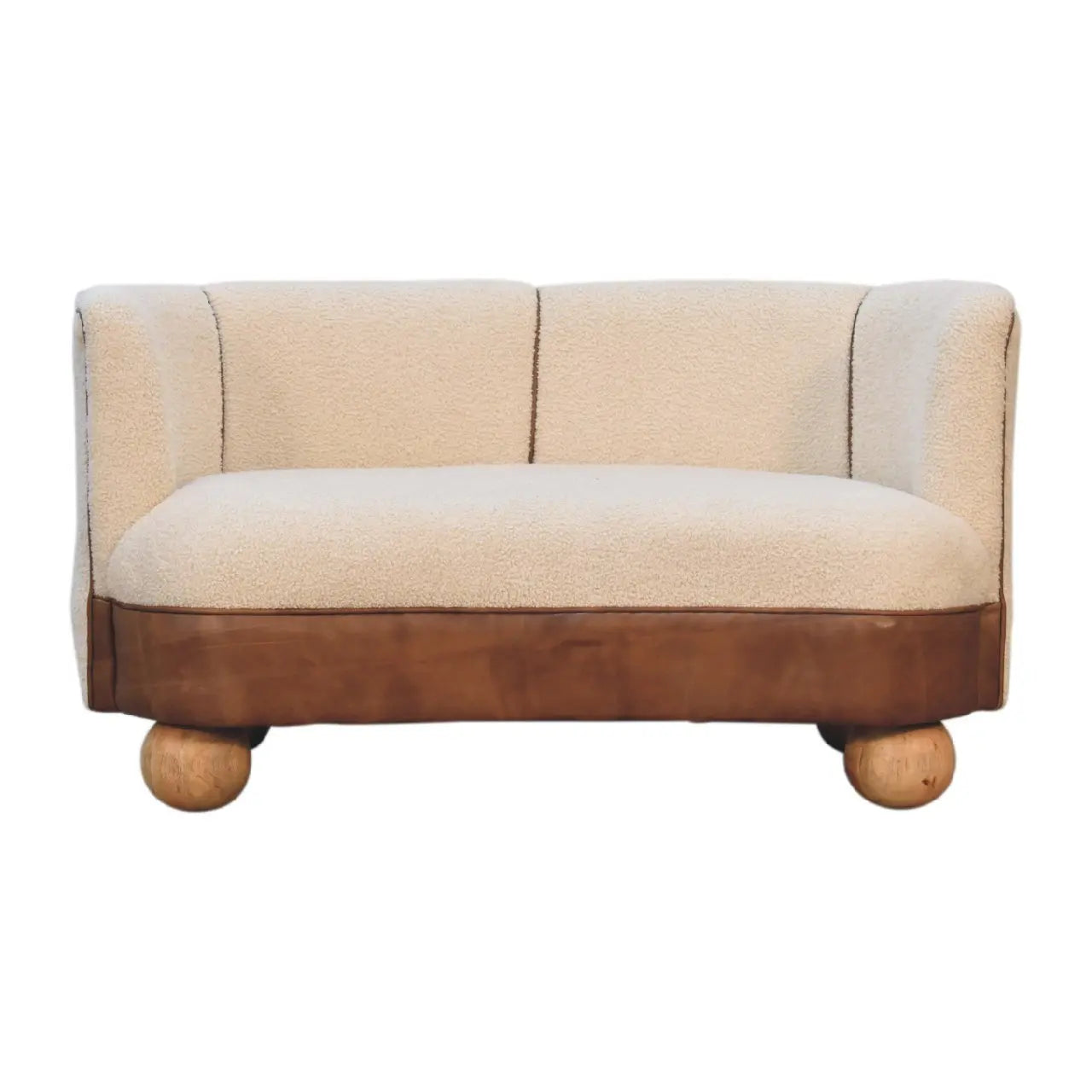 Bouclé upholstered sofa with buffalo leather seat and solid mango wood feet