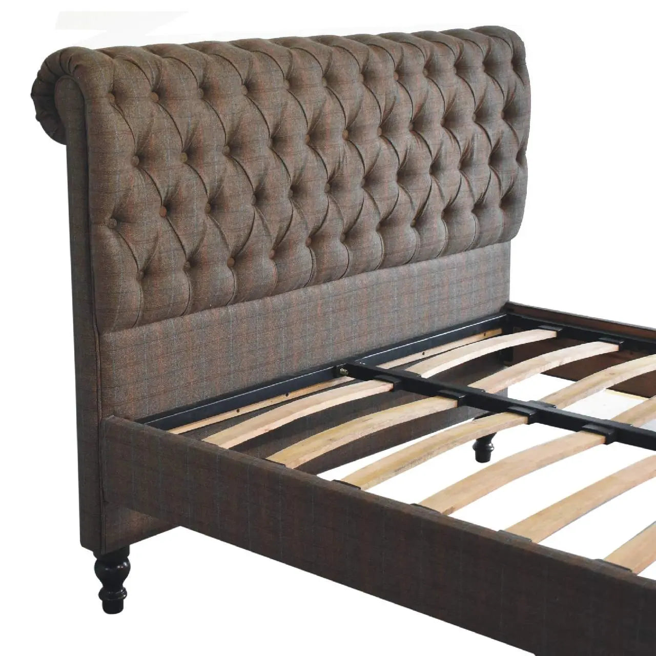close up of deep button tufted tweed upholstery