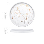 Round decorative item with gold vein pattern on a white background, showing measurements.