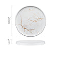 Round marble-patterned coaster with dimensions on a white background