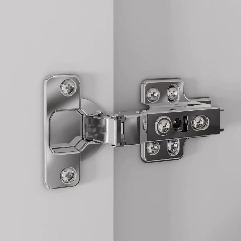 Metallic hinge attached to a gray surface