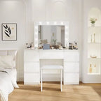 White vanity table with mirror in a bedroom setting