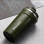 Green shaker bottle with 'Cofee' branding on a gray surface
